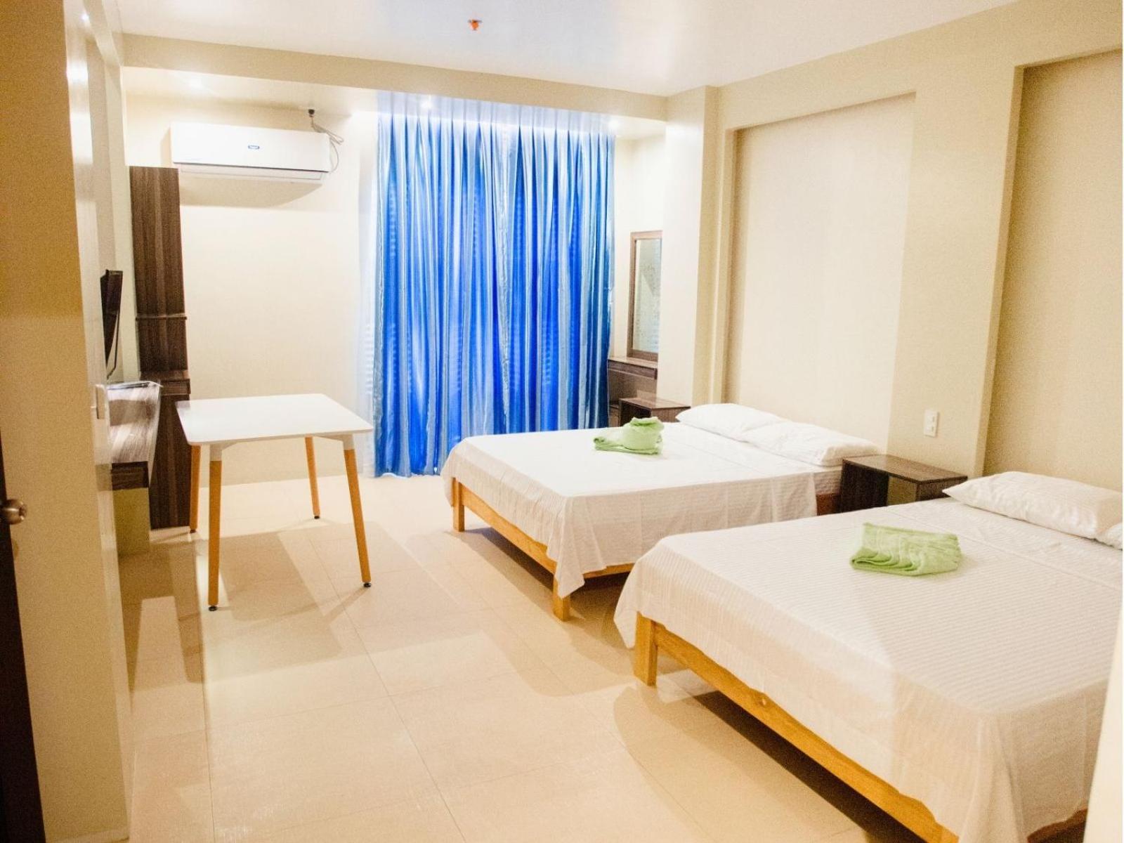 Arc Homes Hotel Panglao Powered By Cocotel Quarto foto
