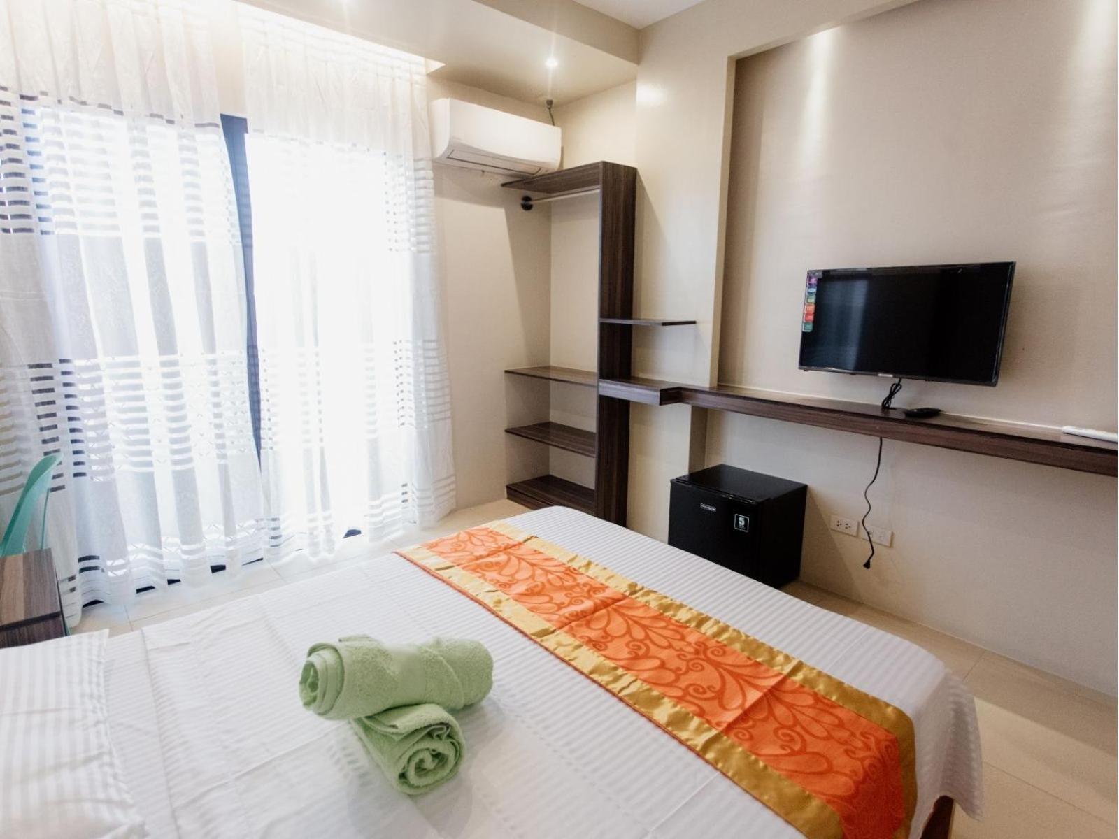 Arc Homes Hotel Panglao Powered By Cocotel Quarto foto