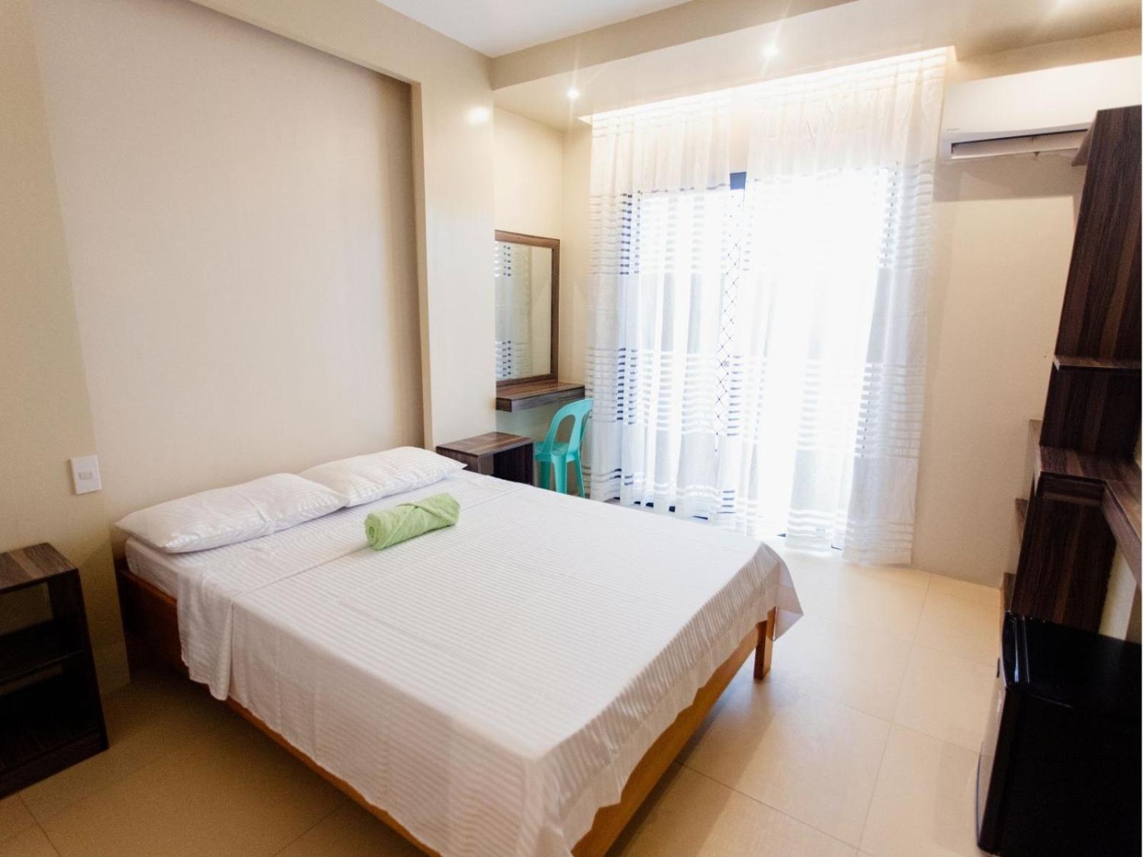 Arc Homes Hotel Panglao Powered By Cocotel Quarto foto